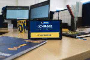 In-Site-Tablet-welcome-screen-on-desk-scaled